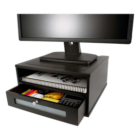 Victor® black wooden monitor riser with an open storage drawer containing office supplies
